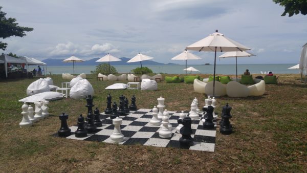 life size chess board, umbrellas, bean bags